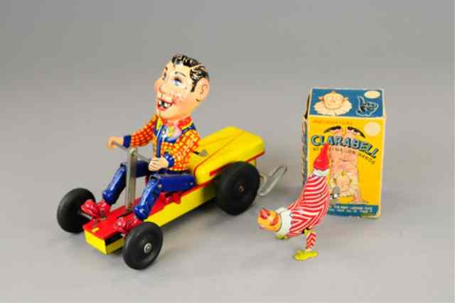 Appraisal: HOWDY DOODY AND CLARABELLE TOYS Both done in tin lithography