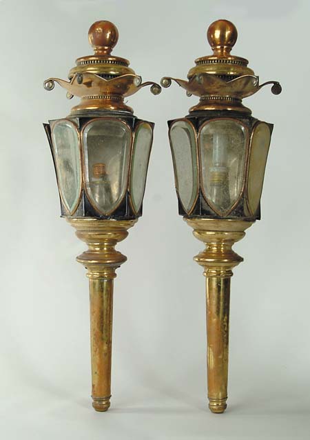 Appraisal: PAIR OF FANCY BRASS ELECTRIFIED COACH LAMPS Beveled glass elongated