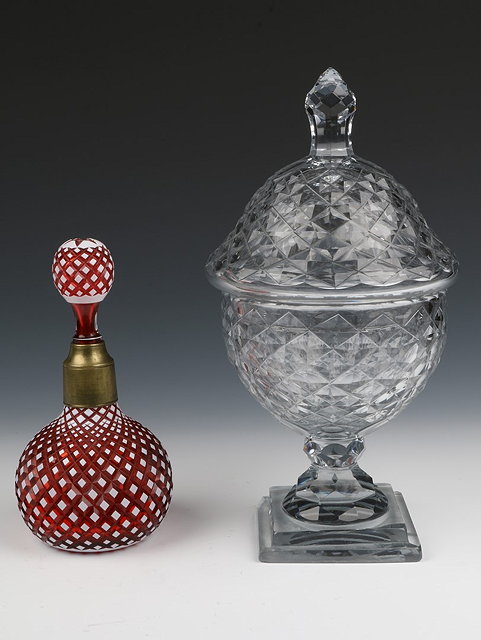 Appraisal: A BOHEMIAN RUBY AND WHITE OVERLAID GLASS DECANTER AND STOPPER