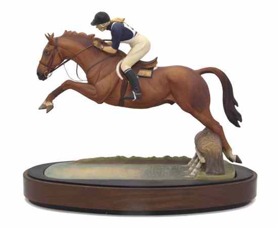 Appraisal: A Royal Worcester Porcelain Model of a Steeplechaser depicting the