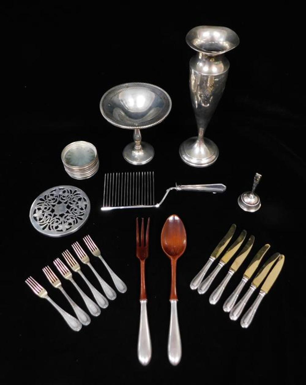 Appraisal: SILVER Twenty-six pieces of silver many weighted with other materials