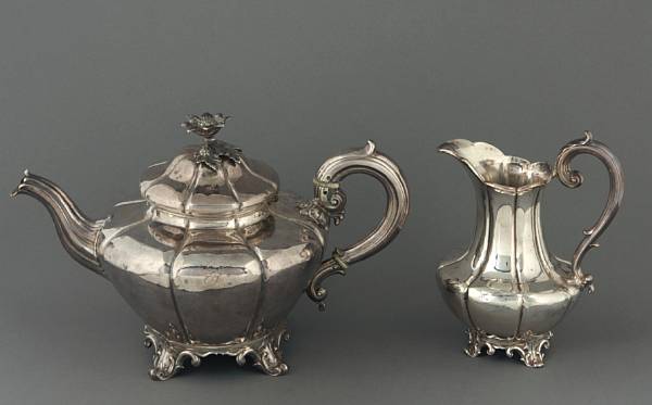 Appraisal: A Victorian silver matching assembled melon form teapot and creamer