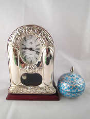 Appraisal: A silver faced mantel clock ht cm and an enamelled