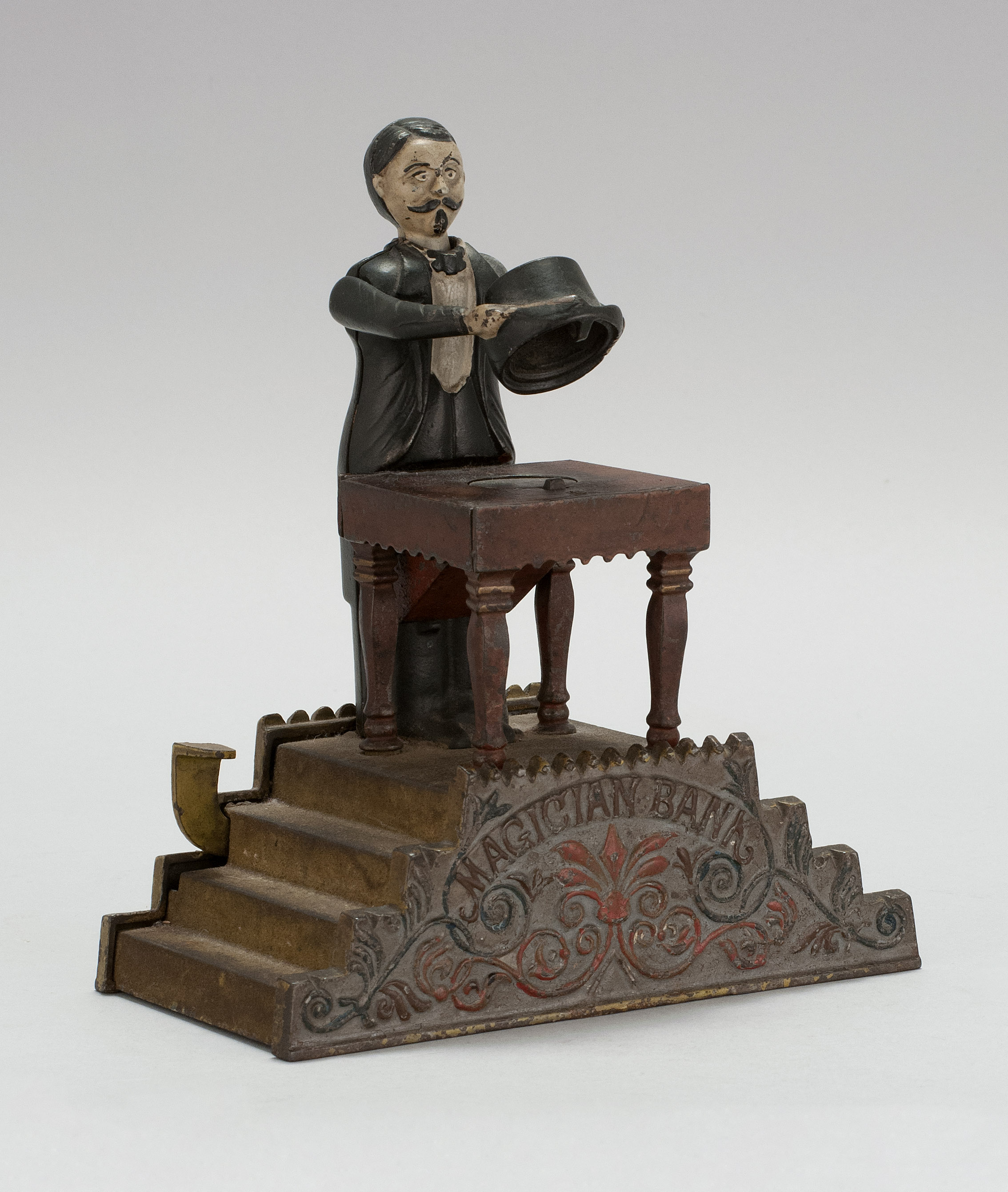 Appraisal: MAGICIAN BANK CAST IRON MECHANICAL BANK Patented By J E