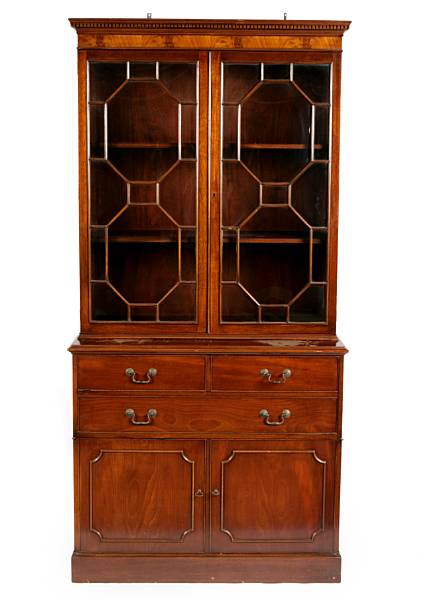 Appraisal: A Regency style mahogany bookcase cabinet manufactured by Baker th