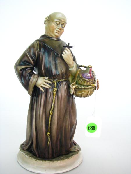 Appraisal: A Capodimonte Italian Borsato porcelain figure depicting a monk carrying