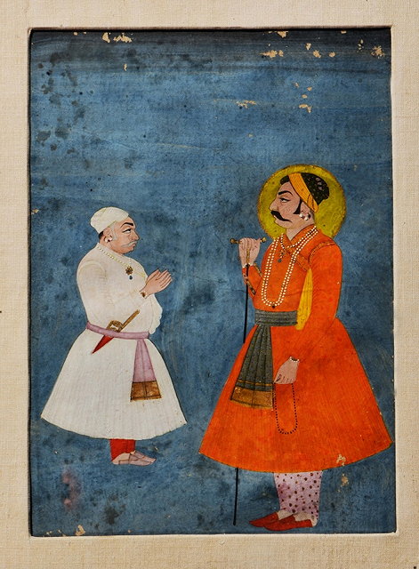 Appraisal: AN INDIAN MINIATURE PAINTED WITH A DIGNATORY holding a staff