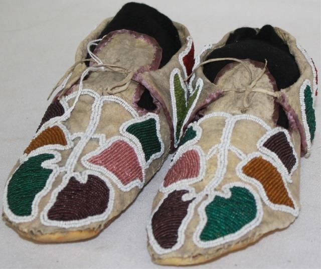 Appraisal: EARLY TH CENTURY EASTERN PLAINS BEADEDNATIVE AMERICAN MOCCASINS STYLED LEAF