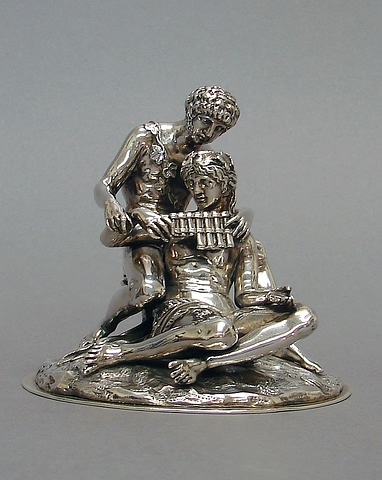 Appraisal: Male figure assisting seated female in playing panpipes th century