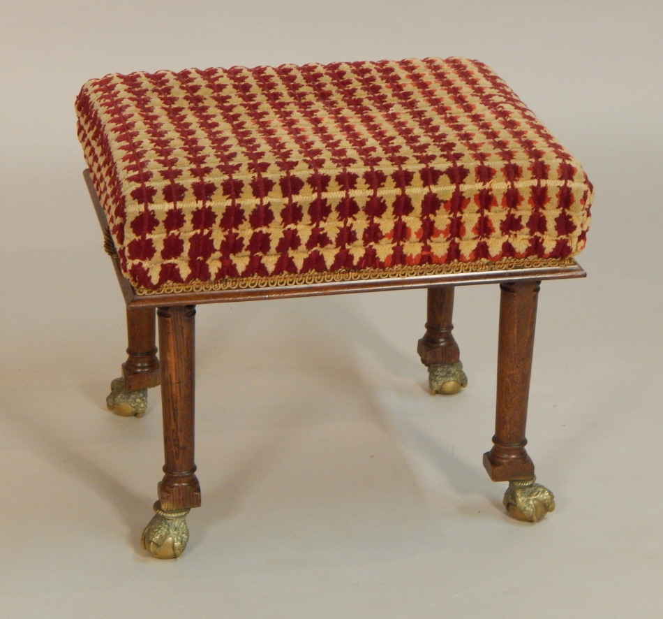 Appraisal: A thC oak stool with a padded seat on turned