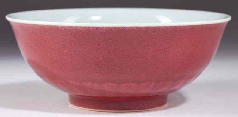 Appraisal: Chinese Oxblood Porcelain Bowllow-footed form the underside with the Yongzheng