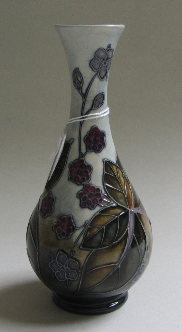 Appraisal: A Moorcroft pottery vase late th century decorated with blackberries