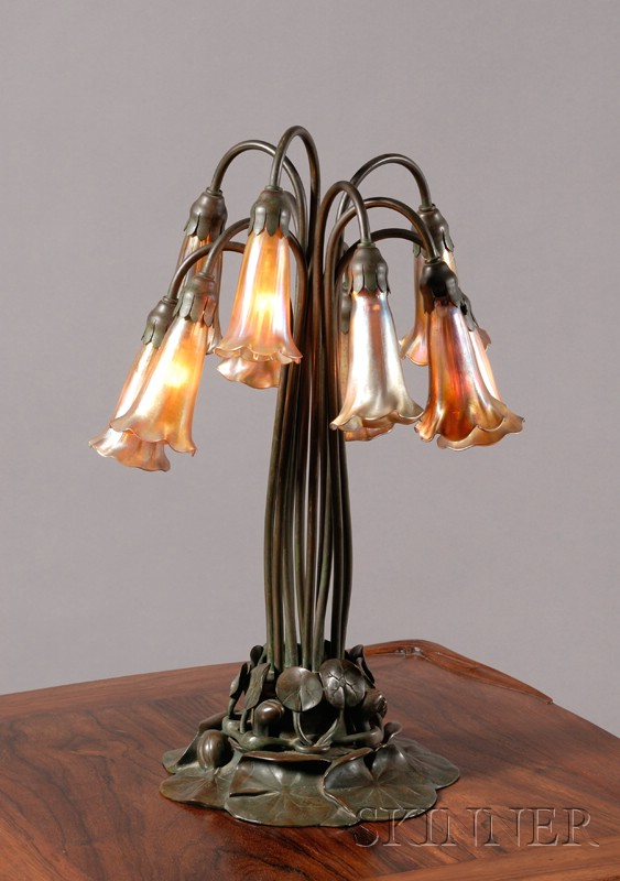 Appraisal: Tiffany Studios Ten-light Favrile Glass and Green-patinated Bronze Lily Lamp