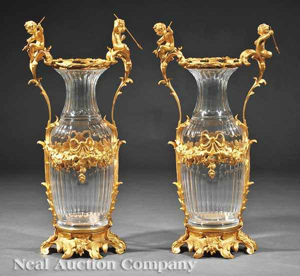 Appraisal: A Pair of Louis XV-Style Gilt Bronze-Mounted Glass Urns the