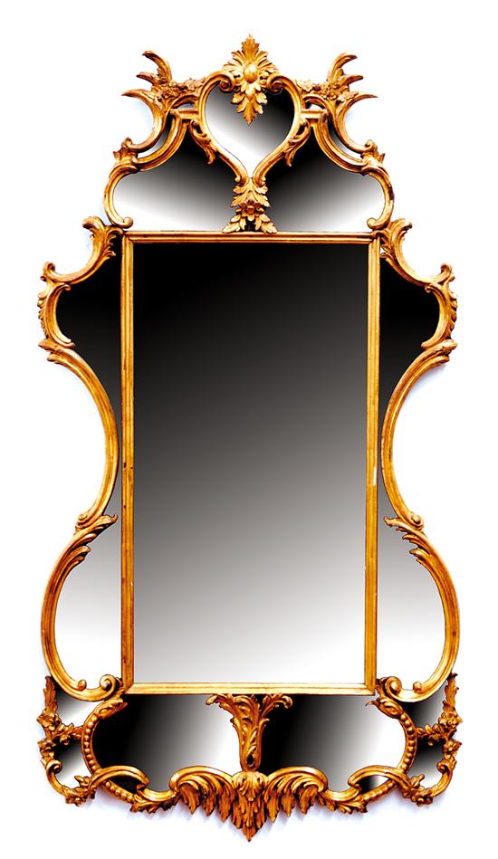 Appraisal: Continental carved giltwood and glass-paneled mirror late th century scrolling