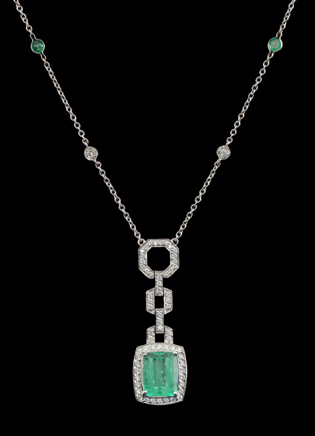 Appraisal: PIACERE EMERALD AND DIAMOND NECKLACE K white gold necklace featuring