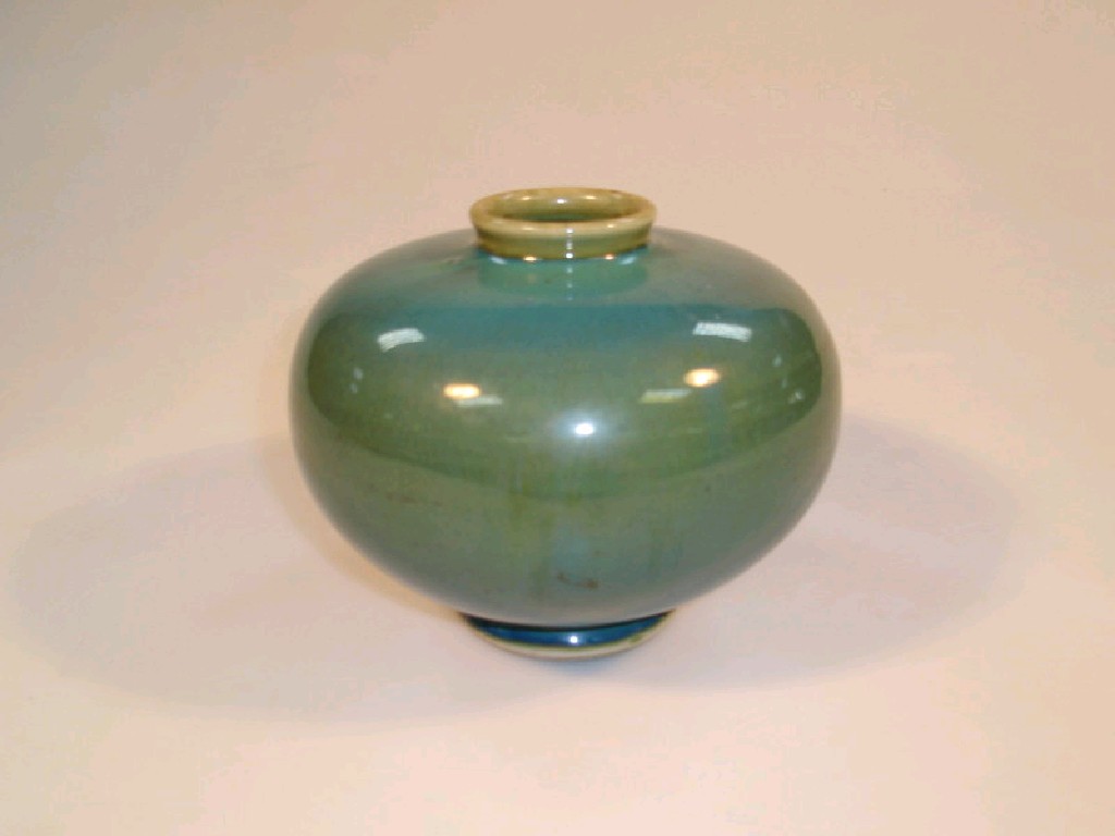 Appraisal: A Studio pottery vase of compressed circular form with a