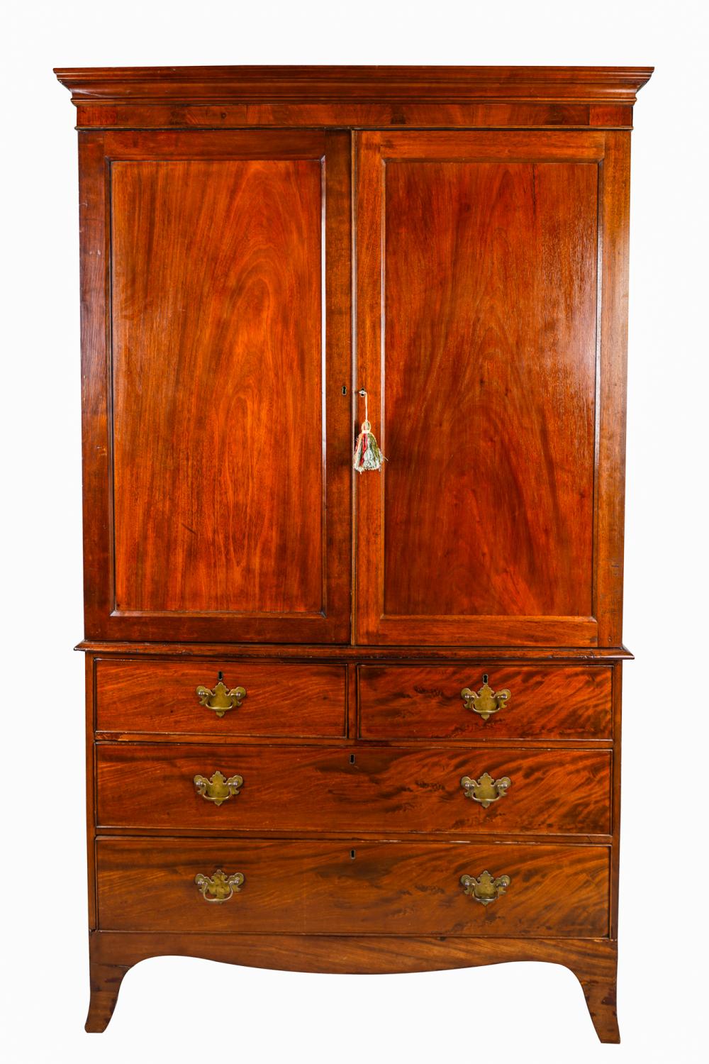 Appraisal: ENGLISH MAHOGANY LINEN PRESSthe hinged doors enclosing two shelves over