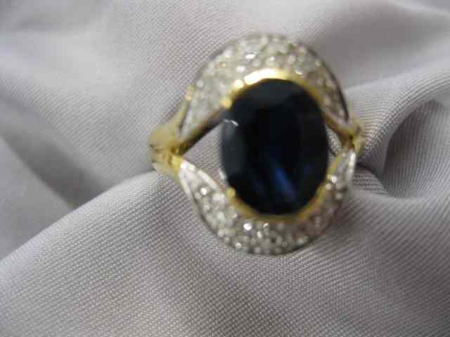 Appraisal: Sapphire Diamond Ring carat deep blue gem with diamonds on