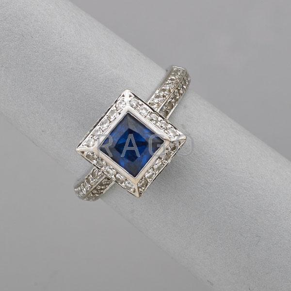 Appraisal: CONTEMPORARY BLUE SAPPHIRE AND DIAMOND RING Condition Report