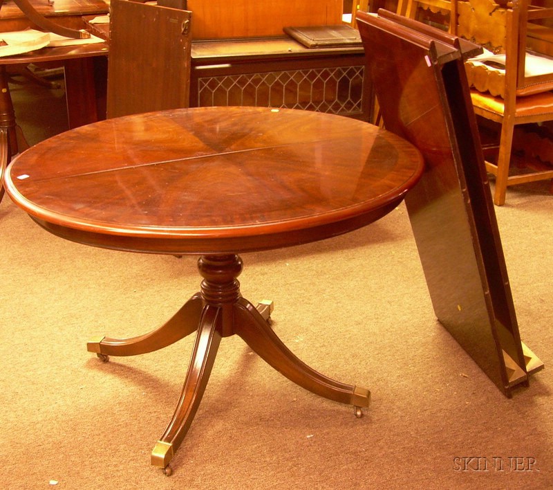 Appraisal: Georgia-style Oval Mahogany Pedestal-base Breakfast Table with two leaves