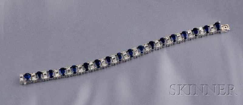 Appraisal: Sapphire and Diamond Bracelet composed of eighteen oval-cut sapphires measuring