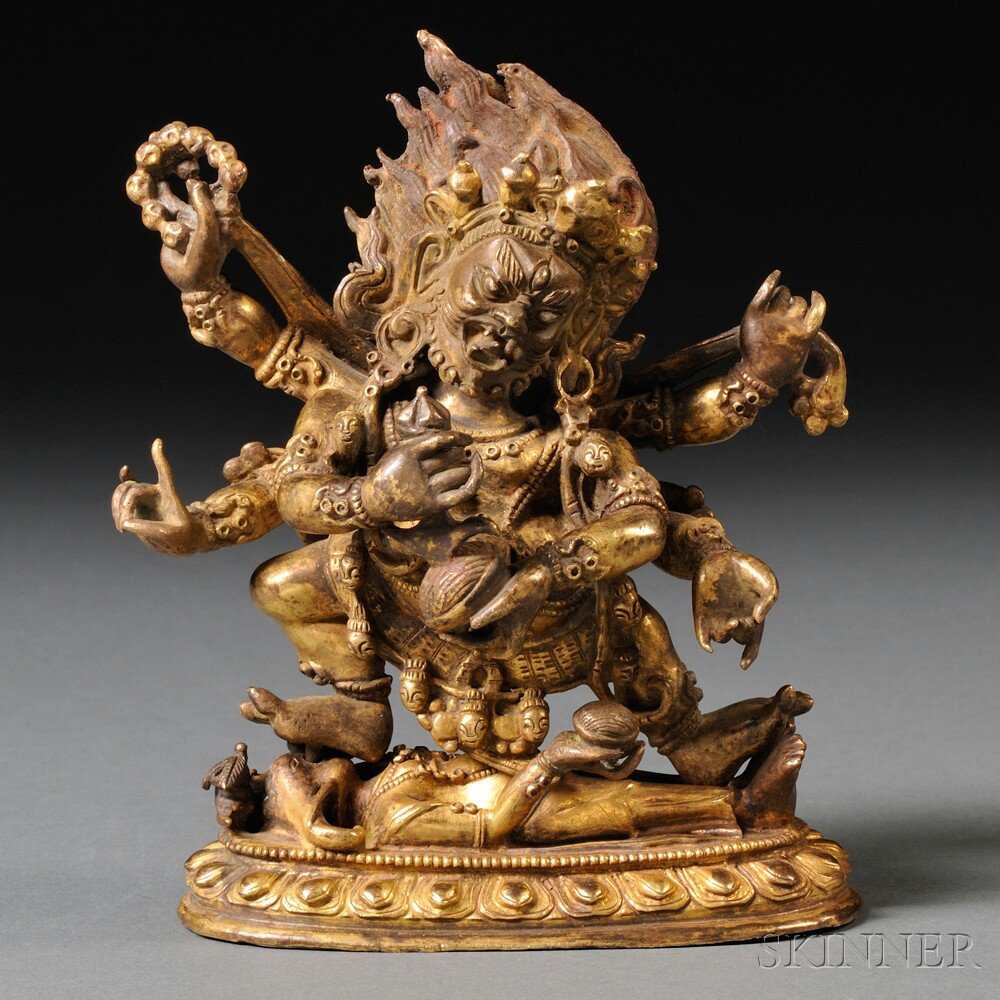 Appraisal: Gilt-bronze Figure of Mahakala Sino-Tibet the six-armed figure standing in