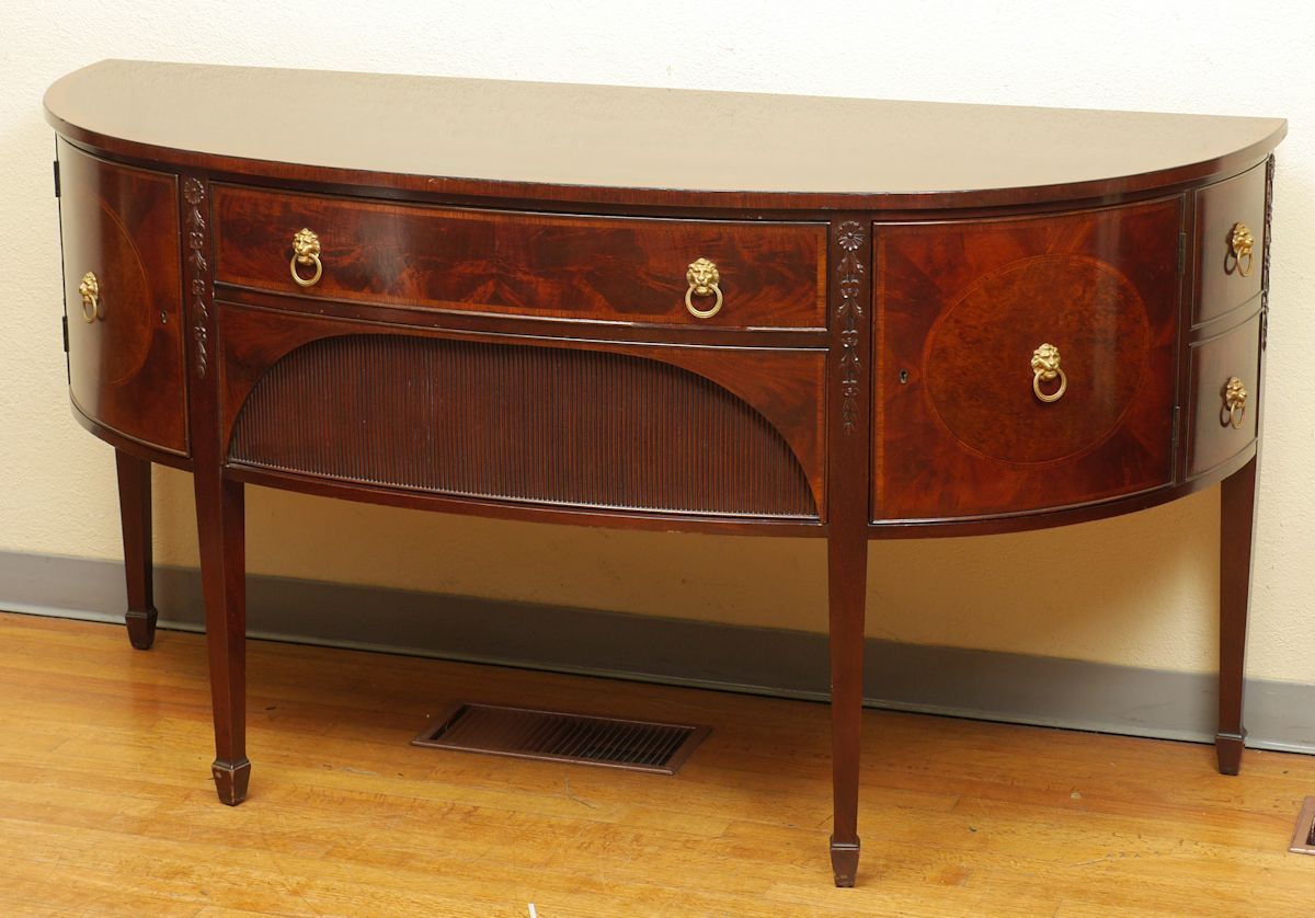 Appraisal: IRWIN BANDED MAHOGANY SWELL FRONT SIDEBOARD Swell front top drawer