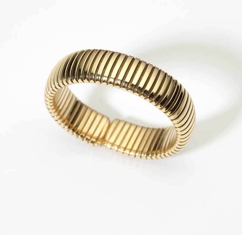 Appraisal: An Italian gold tubogas flexible bracelet Stamped K gms ''