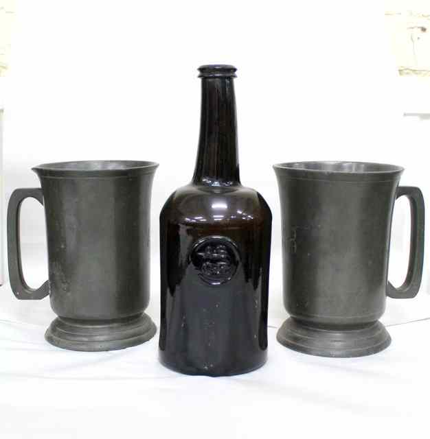 Appraisal: AN ALL SOULS COMMON ROOM BROWN GLASS WINE BOTTLE high