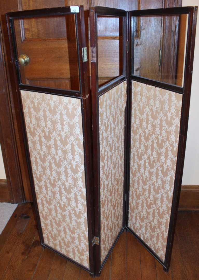 Appraisal: An Edwardian mahogany threefold screen AF