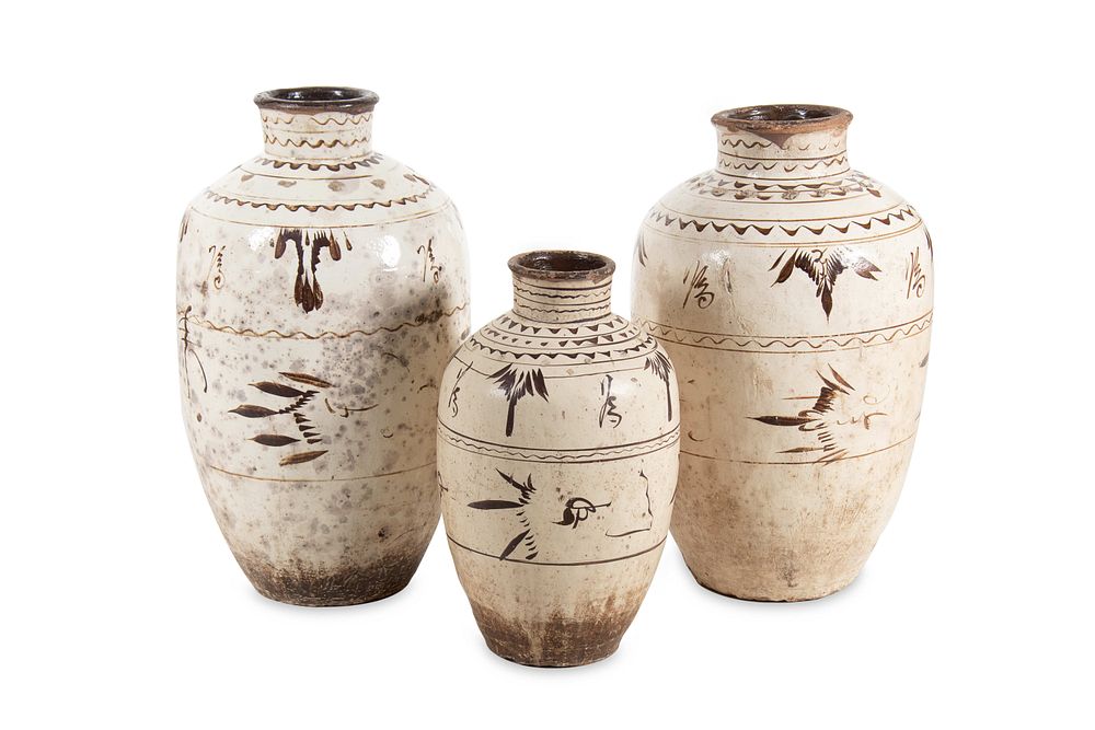 Appraisal: Three Chinese Cizhou Pottery Storage Jars Three Chinese Cizhou Pottery