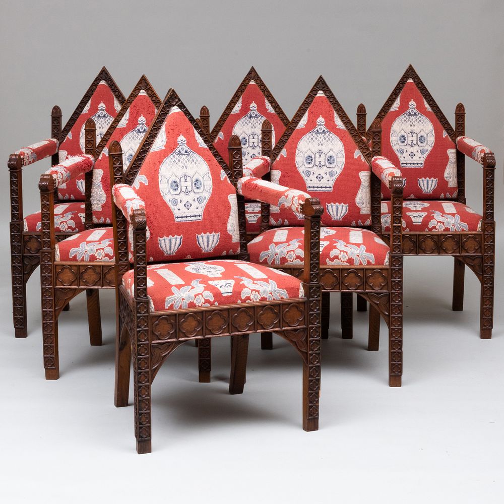 Appraisal: Set of Six English Neo-Gothic Carved Oak Armchairs Each upholstered