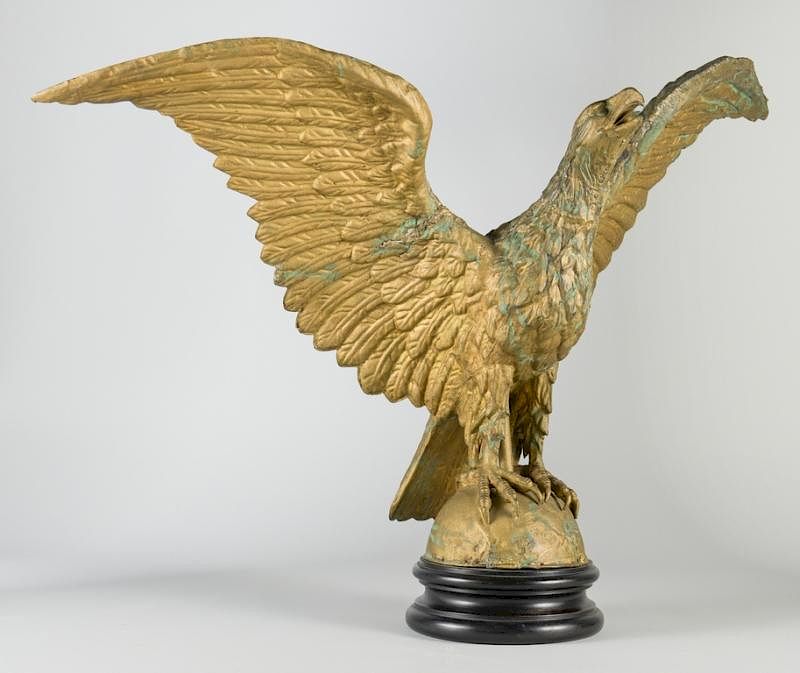 Appraisal: Eagle Weathervane w Ebonized Base American molded gilt weathervane modeled