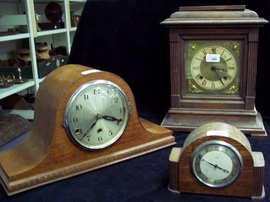 Appraisal: An oak mantel clock playing Westminster Chimes cm wide and