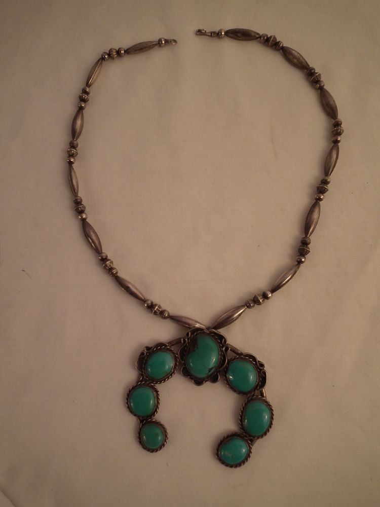 Appraisal: NAVAJO SILVER TURQUOISE NECKLACE Navajo pawn sterling silver necklace with