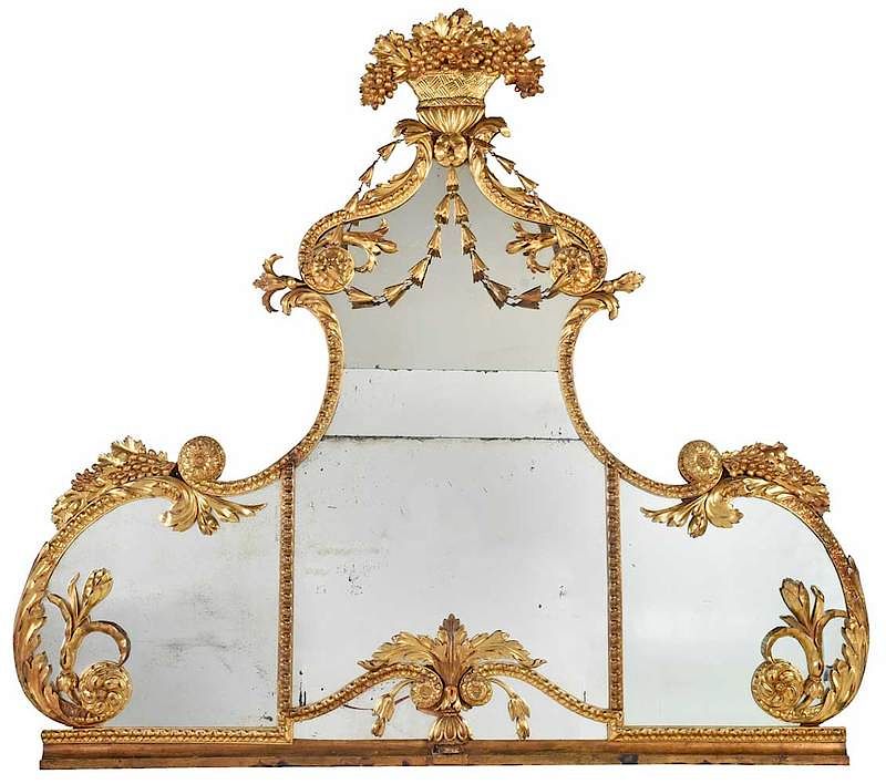 Appraisal: Classical Carved and Gilt Wood Mirror British circa with basket