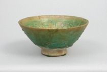 Appraisal: Small Medieval Persian Bowl ca th th century Green monochrome