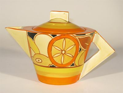 Appraisal: Sliced Fruit' a large Clarice Cliff Bizarre Conical teapot and