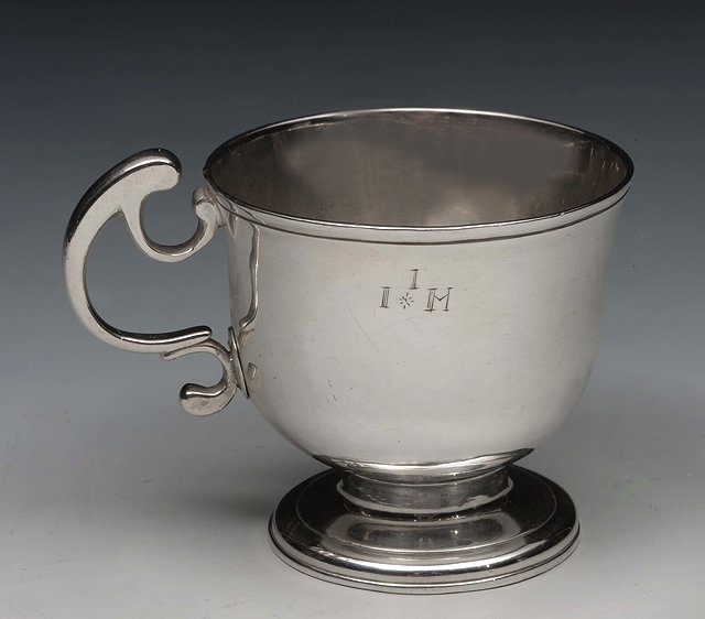 Appraisal: A GEORGE II SILVER TOT-CUP with a turned flared bowl