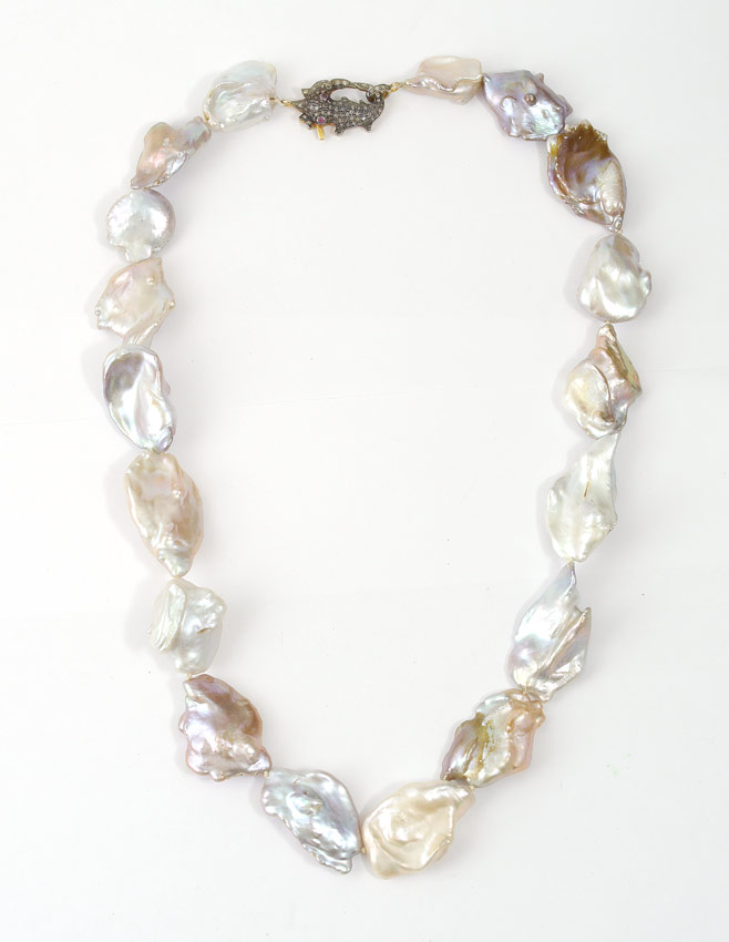 Appraisal: BAROQUE PEARL NECKLACE WITH DIAMOND FIGURAL CLASP X mm large