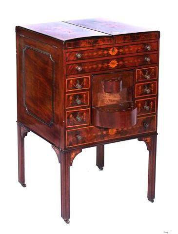 Appraisal: A GEORGIAN MAHOGANY AND SATINWOOD INLAID DRESSING CABINET with twin