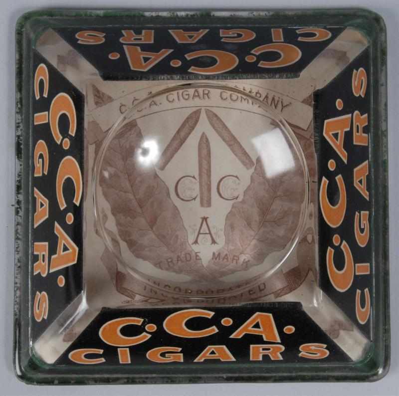 Appraisal: CCCA Cigars Advertising Magnifying Change Tray Description to Original felt