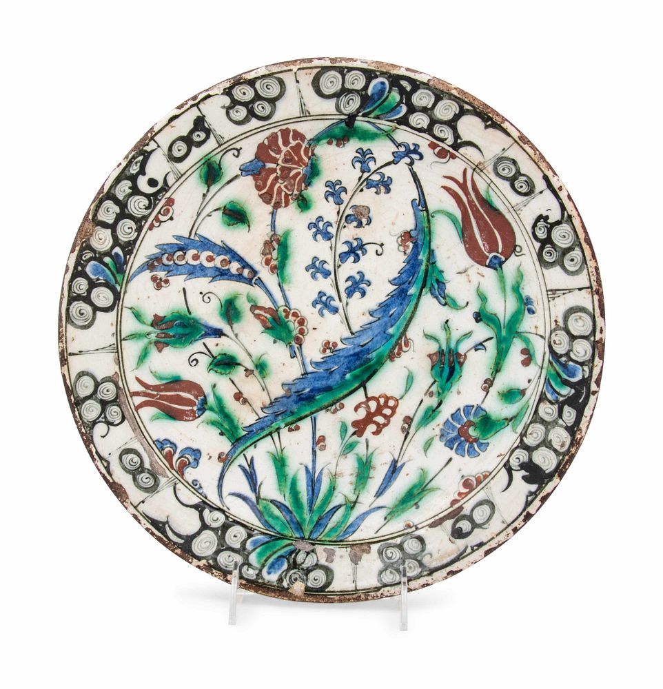 Appraisal: An Iznik Pottery Charger An Iznik Pottery Charger Ottoman Turkey