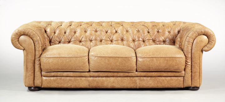 Appraisal: Edwardian Leather-Upholstered Chesterfield Sofa early th century the scrolled back