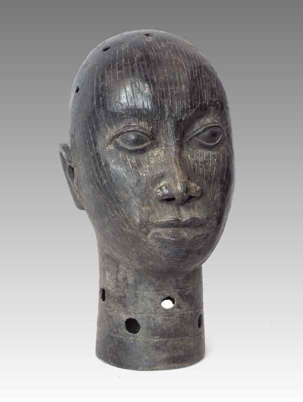 Appraisal: NIGERIAN AFRICAN BRONZE HEAD SCULPTURE Open head with pierced holes