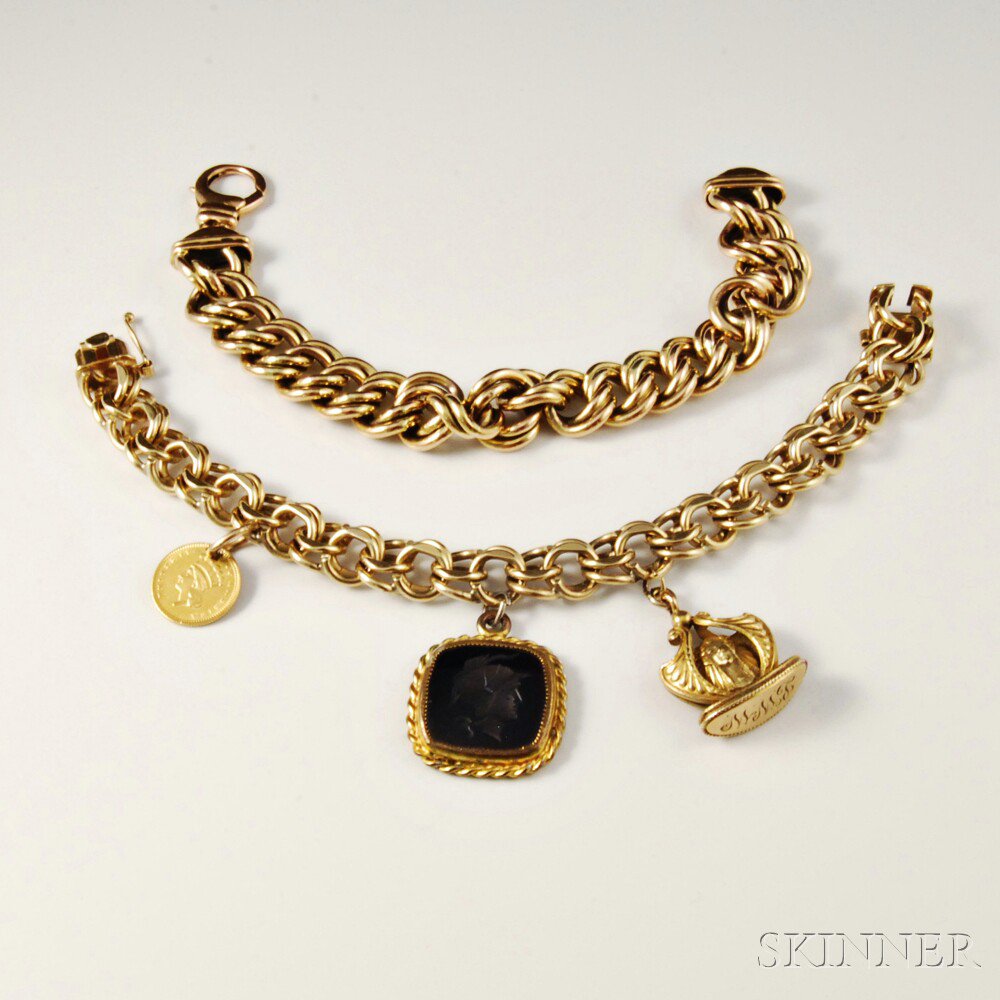 Appraisal: Two kt Gold Bracelets one with three charms including an