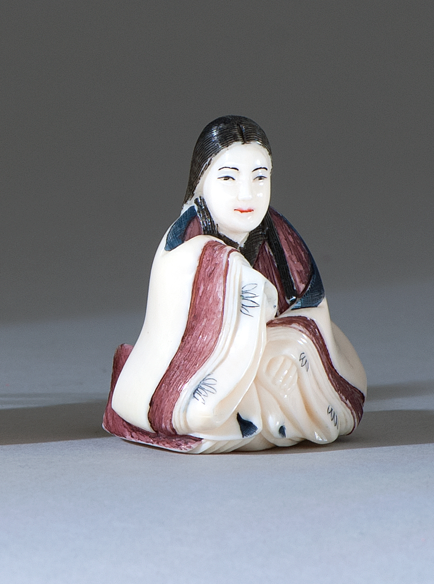 Appraisal: POLYCHROME IVORY NETSUKE Depicting the Genji Poetess in seated position