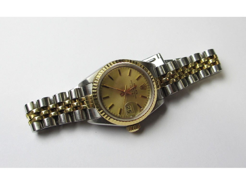 Appraisal: A ladies Rolex bicolour Oyster Perpetual date wrist watch with