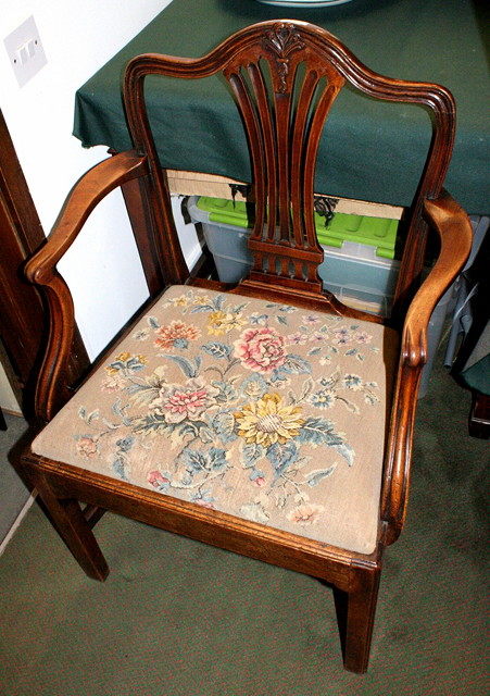 Appraisal: A GEORGE III HEPPLEWHITE MAHOGANY ELBOW CHAIR with splat back